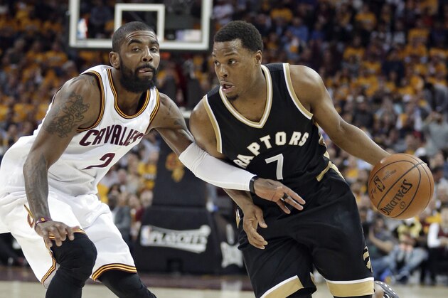 Toronto Raptors' Kyle Lowry (7) drives past Cleveland Cavaliers' Kyrie Irving (2) during the first half in Game 2 of a second-round NBA basketball playoff series, Wednesday, May 3, 2017, in Cleveland. The Cavaliers won 125-103. (AP Photo/Tony Dejak)