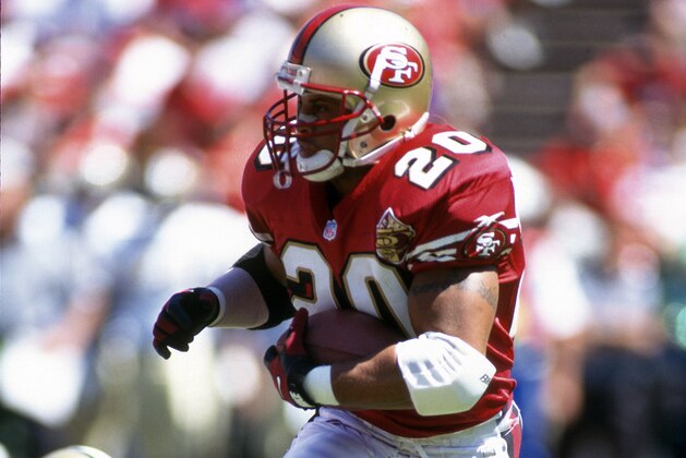 SAN FRANCISCO, CA - SEPTEMBER 1:  Derek Loville #20 of the San Francisco 49ers carries the ball against the New Orleans Saints during an NFL football game September 1, 1996 at Candlestick Park in San Francisco, California. Loville played for the 49ers from 1993-96. (Photo by Focus on Sport/Getty Images)
