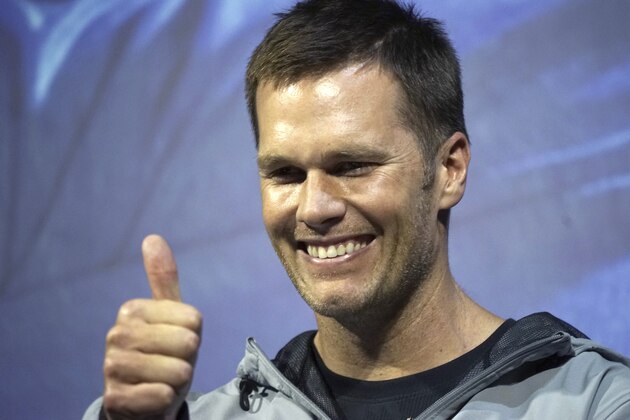 New England Patriots quarterback Tom Brady gestures during a promotional event Thursday, June 22, 2017, in Tokyo. The Super Bowl-winning quarterback is on a week long promotional tour of China and Japan for a sportswear maker. (AP Photo/Eugene Hoshiko) New England Patriots quarterback Tom Brady gestures during a promotional event Thursday, June 22, 2017, in Tokyo. The Super Bowl-winning quarterback is on a week long promotional tour of China and Japan for a sportswear maker. (AP Photo/Eugene Hoshiko)