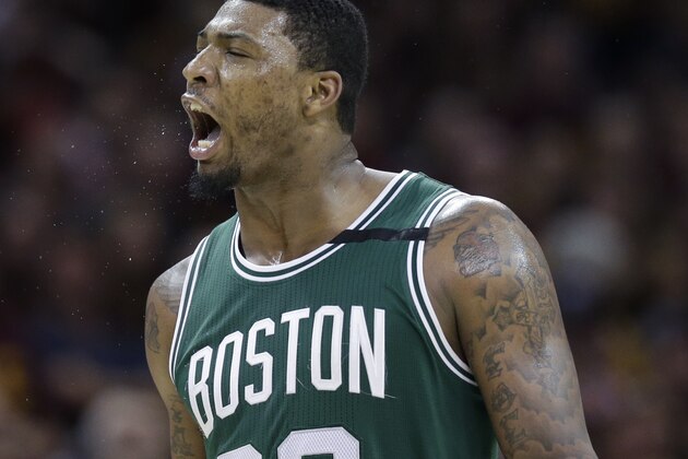 Boston Celtics' Marcus Smart (36) reacts after hitting a three point basket against the Cleveland Cavaliers during the second half of Game 3 of the NBA basketball Eastern Conference finals, Sunday, May 21, 2017, in Cleveland. (AP Photo/Tony Dejak)