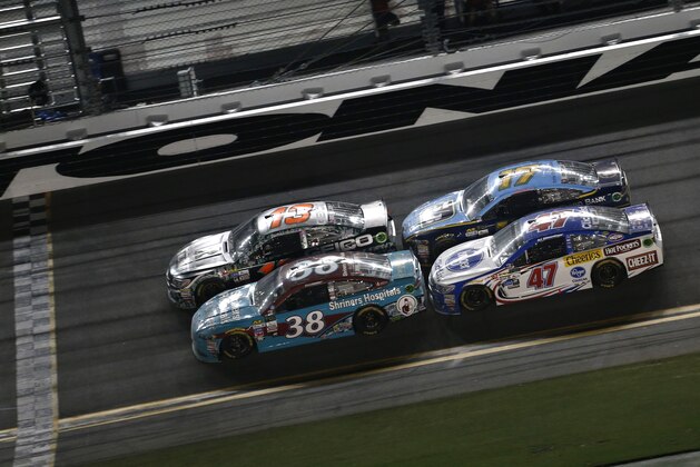 DAYTONA BEACH, FL - JULY 01: Ty Dillon, driver of the #13 GEICO Military Chevrolet, David Ragan, driver of the #38 Shriners Hospital for Chldrn 95th Annvrsry Ford,  AJ Allmendinger, driver of the #47 Kroger ClickList Chevrolet, and Ricky Stenhouse Jr., driver of the #17 Fifth Third Bank Ford, race during the Monster Energy NASCAR Cup Series 59th Annual Coke Zero 400 Powered By Coca-Cola at Daytona International Speedway on July 1, 2017 in Daytona Beach, Florida.  (Photo by Matt Sullivan/Getty Images)