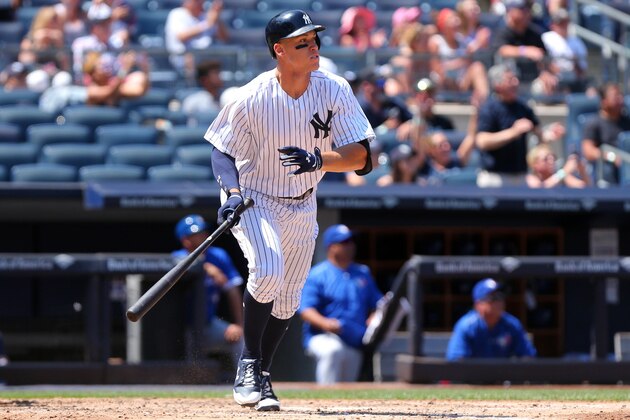 Jul 5, 2017; Bronx, NY, USA; New York Yankees right fielder Aaron Judge (99) watches his two run home run against the Toronto Blue Jays during the fourth inning at Yankee Stadium. Mandatory Credit: Brad Penner-USA TODAY Sports