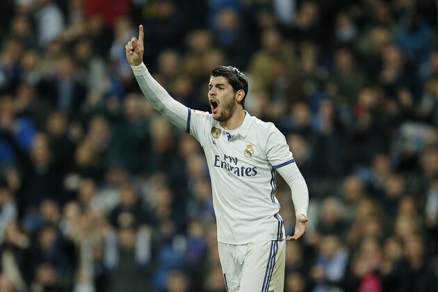 Real Madrid’s Alvaro Morata protests during a Spanish La Liga soccer match between Real Madrid and Las Palmas at the Santiago Bernabeu stadium in Madrid, Spain, Wednesday March 1, 2017. (AP Photo/Paul White)