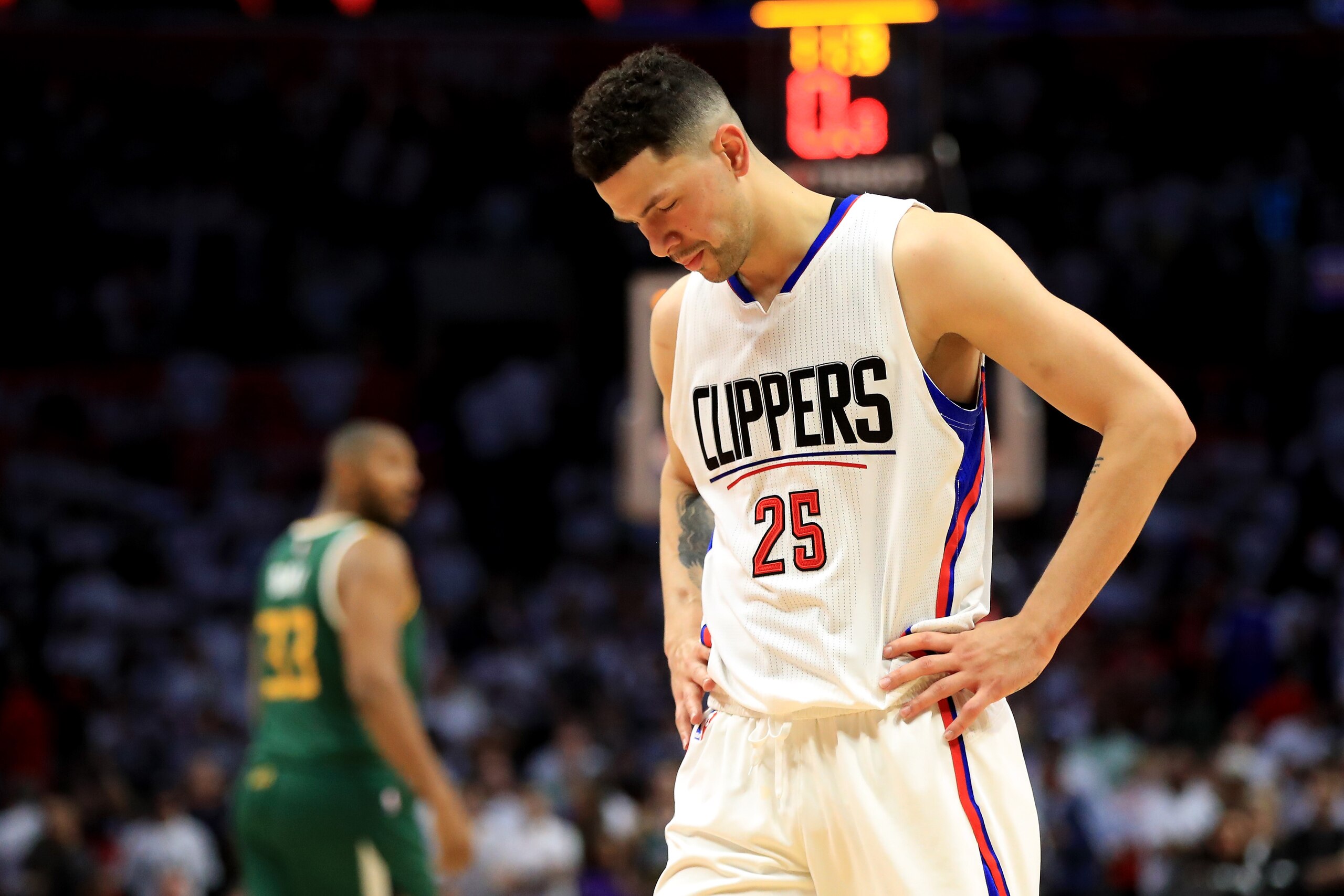 LOS ANGELES, CA - APRIL 30:  Austin Rivers #25 of the Los Angeles Clippers looks on during the second half of Game Seven of the Western Conference Quarterfinals against the Utah Jazz at Staples Center at Staples Center on April 30, 2017 in Los Angeles, California.  NOTE TO USER: User expressly acknowledges and agrees that, by downloading and or using this photograph, User is consenting to the terms and conditions of the Getty Images License Agreement.  (Photo by Sean M. Haffey/Getty Images)