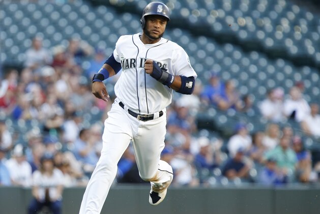 SEATTLE, WA - JULY 05: Robinson Cano #22 of the Seattle Mariners heads home on a single from Ben Gamel #16 in the first inning at Safeco Field on July 5, 2017 in Seattle, Washington. (Photo by Lindsey Wasson/Getty Images)