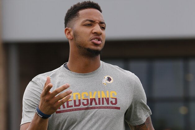 FILE - In this July 29, 2016, file photo, Washington Redskins wide receiver Josh Doctson walks out to the practice field at the team's NFL football training camp in Richmond, Va. With DeSean Jackson and Pierre Garcon gone, 2016 first-round pick Josh Doctson is determined to show he can be a starting wide receiver for the Washington Redskins after missing almost all of last season with Achillies tendon injuries.  (AP Photo/Steve Helber, File)