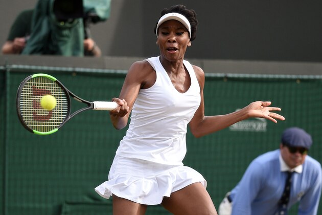 US player Venus Williams returns against Japan's Naomi Osaka during their women's singles third round match on the fifth day of the 2017 Wimbledon Championships at The All England Lawn Tennis Club in Wimbledon, southwest London, on July 7, 2017. / AFP PHOTO / Oli SCARFF / RESTRICTED TO EDITORIAL USE (Photo credit should read OLI SCARFF/AFP/Getty Images) US player Venus Williams returns against Japan's Naomi Osaka during their women's singles third round match on the fifth day of the 2017 Wimbledon Championships at The All England Lawn Tennis Club in Wimbledon, southwest London, on July 7, 2017. / AFP PHOTO / Oli SCARFF / RESTRICTED TO EDITORIAL USE (Photo credit should read OLI SCARFF/AFP/Getty Images)