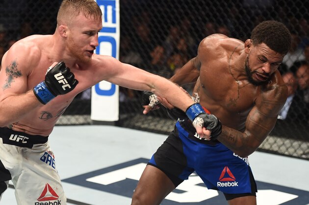 LAS VEGAS, NV - JULY 07:  (L-R) Justin Gaethje punches Michael Johnson in their lightweight bout during The Ultimate Fighter Finale at T-Mobile Arena on July 7, 2017 in Las Vegas, Nevada.  (Photo by Brandon Magnus/Zuffa LLC/Zuffa LLC via Getty Images)