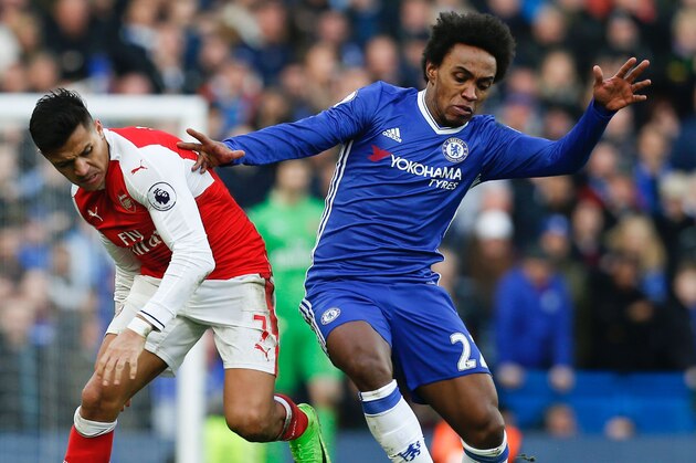 Arsenal's Chilean striker Alexis Sanchez (L) vies with Chelsea's Brazilian midfielder Willian (R) during the English Premier League football match between Chelsea and Arsenal at Stamford Bridge in London on February 4, 2017. / AFP / Ian KINGTON / RESTRICTED TO EDITORIAL USE. No use with unauthorized audio, video, data, fixture lists, club/league logos or 'live' services. Online in-match use limited to 75 images, no video emulation. No use in betting, games or single club/league/player publications.  /         (Photo credit should read IAN KINGTON/AFP/Getty Images)
