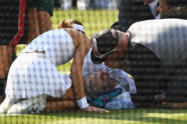 LONDON, ENGLAND - JULY 06:  Bethanie Mattek-Sands of The United States receives treatment from the medical team and later retires from the Ladies Singles second round match against Sorana Cirstea of Romania on day four of the Wimbledon Lawn Tennis Championships at the All England Lawn Tennis and Croquet Club on July 6, 2017 in London, England.  (Photo by David Ramos/Getty Images)