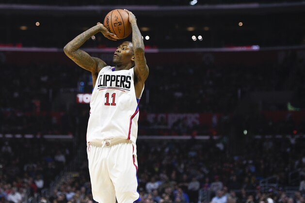 Los Angeles Clippers guard Jamal Crawford (11) in action against the Houston Rockets during the first half of an NBA basketball game in Los Angeles, Wednesday, March 1, 2017. (AP Photo/Kelvin Kuo)