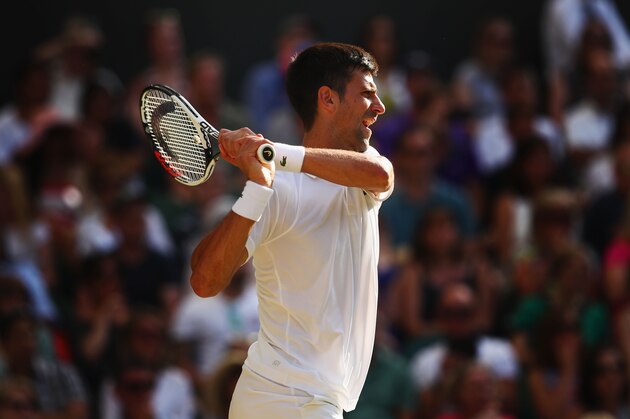 LONDON, ENGLAND - JULY 08:  Novak Djokovic of Serbia plays a backand during the Gentlemen's Singles third round match against Ernests Gulbis of Latvia on day six of the Wimbledon Lawn Tennis Championships at the All England Lawn Tennis and Croquet Club on July 8, 2017 in London, England.  (Photo by Clive Brunskill/Getty Images)