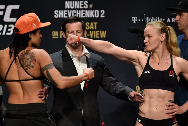 LAS VEGAS, NV - JULY 07:  (L-R) Opponents Amanda Nunes of Brazil and Valentina Shevchenko of Kyrgyzstan face off during the UFC 213 weigh-in at the Park Theater on July 7, 2017 in Las Vegas, Nevada. (Photo by Jeff Bottari/Zuffa LLC/Zuffa LLC via Getty Images)