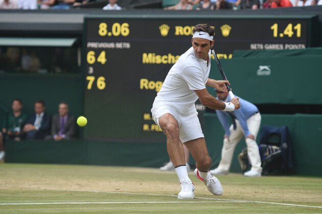 Switzerland's Roger Federer returns against Germany's Mischa Zverev during their men's singles third round match on the sixth day of the 2017 Wimbledon Championships at The All England Lawn Tennis Club in Wimbledon, southwest London, on July 8, 2017. / AFP PHOTO / Oli SCARFF / RESTRICTED TO EDITORIAL USE        (Photo credit should read OLI SCARFF/AFP/Getty Images)