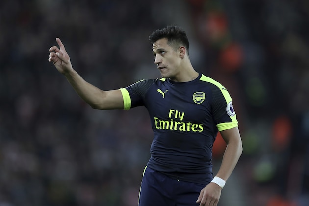 Arsenal's Alexis Sanchez argues over the placement of a freekick during the English Premier League soccer match between Southampton and Arsenal at St Mary's stadium in Southampton, England, Wednesday, May 10, 2017. (AP Photo/Alastair Grant)