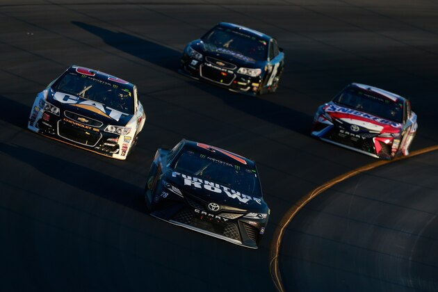 SPARTA, KY - JULY 08: Martin Truex Jr., driver of the #78 Furniture Row/Denver Mattress Toyota, leads a pack of cars during the Monster Energy NASCAR Cup Series Quaker State 400 presented by Advance Auto Parts at Kentucky Speedway on July 8, 2017 in Sparta, Kentucky. (Photo by Matt Sullivan/Getty Images) SPARTA, KY - JULY 08: Martin Truex Jr., driver of the #78 Furniture Row/Denver Mattress Toyota, leads a pack of cars during the Monster Energy NASCAR Cup Series Quaker State 400 presented by Advance Auto Parts at Kentucky Speedway on July 8, 2017 in Sparta, Kentucky. (Photo by Matt Sullivan/Getty Images)