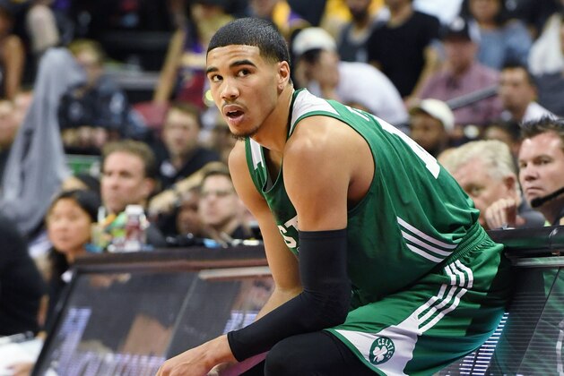 LAS VEGAS, NV - JULY 08:  Jayson Tatum #11 of the Boston Celtics waits to check into a 2017 Summer League game against the Los Angeles Lakers at the Thomas & Mack Center on July 8, 2017 in Las Vegas, Nevada. Boston won 86-81. NOTE TO USER: User expressly acknowledges and agrees that, by downloading and or using this photograph, User is consenting to the terms and conditions of the Getty Images License Agreement.  (Photo by Ethan Miller/Getty Images)
