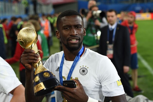 Germany's defender Antonio Ruediger holds the trophy after beating Chile 1-0 to win the 2017 Confederations Cup final football match between Chile and Germany at the Saint Petersburg Stadium in Saint Petersburg on July 2, 2017. / AFP PHOTO / PATRIK STOLLARZ        (Photo credit should read PATRIK STOLLARZ/AFP/Getty Images)