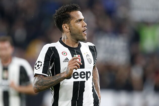 Juventus' Dani Alves celebrates after scoring during the Champions League semi final second leg soccer match between Juventus and Monaco in Turin, Italy, Tuesday, May 9, 2017. (AP Photo/Antonio Calanni)
