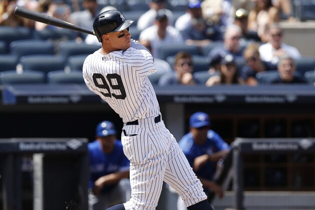 New York Yankees right fielder Aaron Judge (99) hits a fifth-inning single with two runners on base in a baseball game against the Toronto Blue Jays in New York, Wednesday, July 5, 2017. (AP Photo/Kathy Willens)