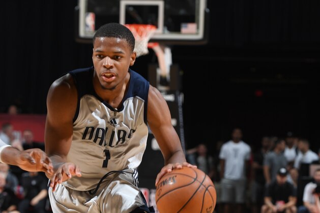 LAS VEGAS, NV - JULY 9:  Dennis Smith Jr. #1 of the Dallas Mavericks handles the ball against the Phoenix Suns during the 2017 Summer League on July 9, 2017 at the Thomas & Mack Center in Las Vegas, Nevada. NOTE TO USER: User expressly acknowledges and agrees that, by downloading and or using this Photograph, user is consenting to the terms and conditions of the Getty Images License Agreement. Mandatory Copyright Notice: Copyright 2017 NBAE (Photo by Garrett Ellwood/NBAE via Getty Images)
