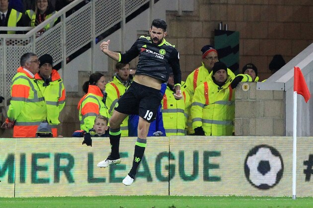 Chelsea's Brazilian-born Spanish striker Diego Costa (C) celebrates scoring his team's first goal during the English Premier League football match between Middlesbrough and Cheslea at Riverside Stadium in Middlesbrough, northeast England on November 20, 2016.
Chelsea won the match 1-0. / AFP / Lindsey PARNABY / RESTRICTED TO EDITORIAL USE. No use with unauthorized audio, video, data, fixture lists, club/league logos or 'live' services. Online in-match use limited to 75 images, no video emulation. No use in betting, games or single club/league/player publications. / (Photo credit should read LINDSEY PARNABY/AFP/Getty Images) Chelsea's Brazilian-born Spanish striker Diego Costa (C) celebrates scoring his team's first goal during the English Premier League football match between Middlesbrough and Cheslea at Riverside Stadium in Middlesbrough, northeast England on November 20, 2016.
Chelsea won the match 1-0. / AFP / Lindsey PARNABY / RESTRICTED TO EDITORIAL USE. No use with unauthorized audio, video, data, fixture lists, club/league logos or 'live' services. Online in-match use limited to 75 images, no video emulation. No use in betting, games or single club/league/player publications. / (Photo credit should read LINDSEY PARNABY/AFP/Getty Images)