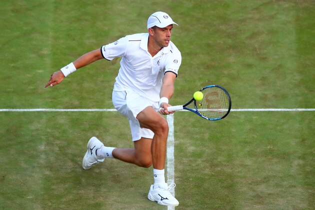 LONDON, ENGLAND - JULY 10:  Gilles Muller of Luxembourg plays a forehand during the Gentlemen's Singles fourth round match against Rafael Nadal of Spain on day seven of the Wimbledon Lawn Tennis Championships at the All England Lawn Tennis and Croquet Club on July 10, 2017 in London, England.  (Photo by Clive Brunskill/Getty Images)