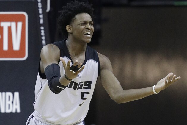 Sacramento Kings' De'Aaron Fox reacts after a play against the Phoenix Suns during the first half of an NBA summer league basketball game, Friday, July 7, 2017, in Las Vegas. (AP Photo/John Locher)