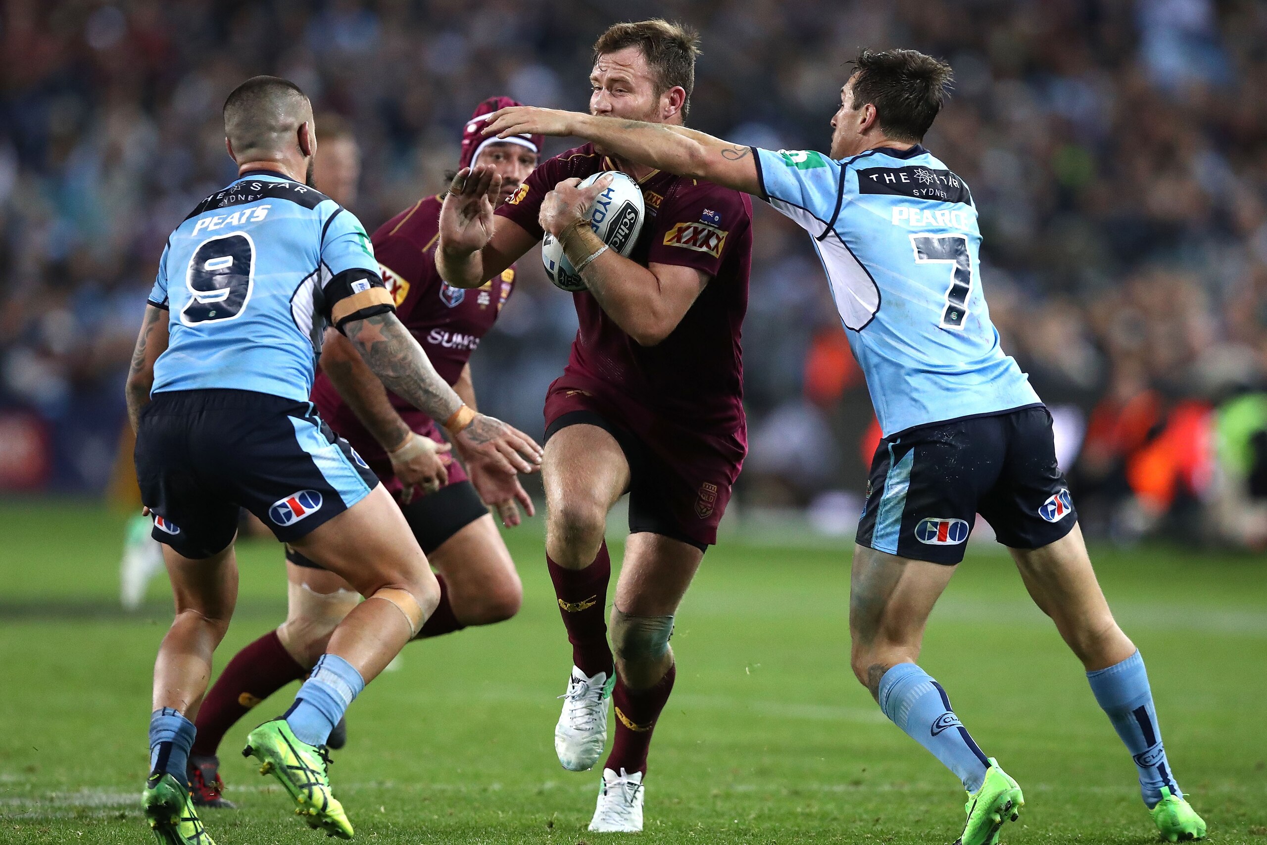 SYDNEY, AUSTRALIA - JUNE 21: Gavin Cooper of the Maroons is tackled by Mitchell Pearce of the Blues during game two of the State Of Origin series between the New South Wales Blues and the Queensland Maroons at ANZ Stadium on June 21, 2017 in Sydney, Australia. (Photo by Ryan Pierse/Getty Images) SYDNEY, AUSTRALIA - JUNE 21: Gavin Cooper of the Maroons is tackled by Mitchell Pearce of the Blues during game two of the State Of Origin series between the New South Wales Blues and the Queensland Maroons at ANZ Stadium on June 21, 2017 in Sydney, Australia. (Photo by Ryan Pierse/Getty Images)