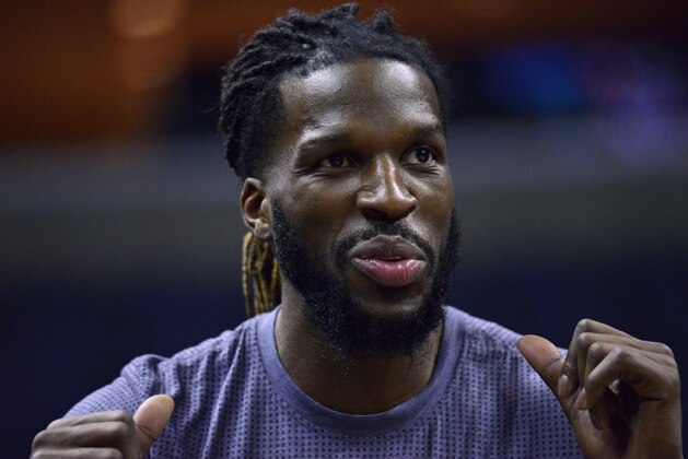 Toronto Raptors forward DeMarre Carroll warms up before an NBA basketball game against the Memphis Grizzlies Wednesday, Jan. 25, 2017, in Memphis, Tenn. (AP Photo/Brandon Dill)