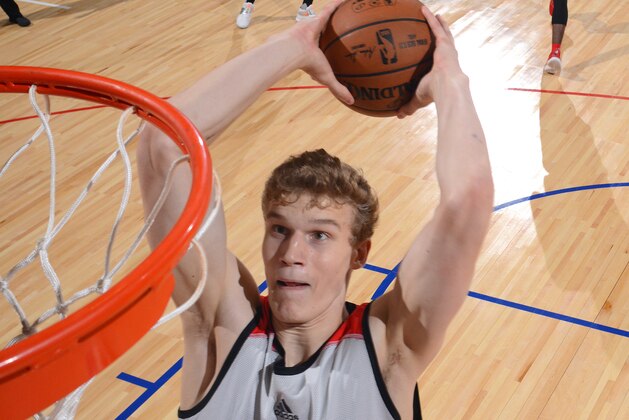 LAS VEGAS, NV - JULY 10: Lauri Markkanen #24 of the Chicago Bulls goes up for a dunk against the Atlanta Hawks during the 2017 Las Vegas Summer League on July 10, 2017 at the Cox Pavilion in Las Vegas, Nevada. NOTE TO USER: User expressly acknowledges and agrees that, by downloading and or using this Photograph, user is consenting to the terms and conditions of the Getty Images License Agreement. Mandatory Copyright Notice: Copyright 2017 NBAE (Photo by David Dow/NBAE via Getty Images)