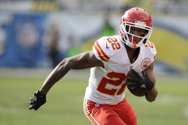 Kansas City Chiefs cornerback Marcus Peters runs with the ball after an interception during the first half of an NFL football game against the San Diego Chargers Sunday, Jan. 1, 2017, in San Diego. (AP Photo/Rick Scuteri)