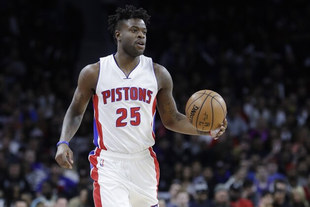 Detroit Pistons forward Reggie Bullock brings the ball up court during the first half of an NBA basketball game against the Cleveland Cavaliers, Thursday, March 9, 2017, in Auburn Hills, Mich. (AP Photo/Carlos Osorio)