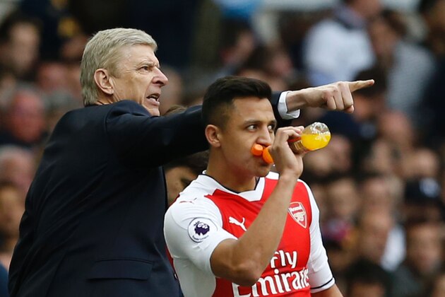 Arsenal's French manager Arsene Wenger (L) gestures alongside Arsenal's Chilean striker Alexis Sanchez during the English Premier League football match between Tottenham Hotspur and Arsenal at White Hart Lane in London, on April 30, 2017. / AFP PHOTO / IKIMAGES / Ian KINGTON / RESTRICTED TO EDITORIAL USE. No use with unauthorized audio, video, data, fixture lists, club/league logos or 'live' services. Online in-match use limited to 75 images, no video emulation. No use in betting, games or single club/league/player publications. / (Photo credit should read IAN KINGTON/AFP/Getty Images) Arsenal's French manager Arsene Wenger (L) gestures alongside Arsenal's Chilean striker Alexis Sanchez during the English Premier League football match between Tottenham Hotspur and Arsenal at White Hart Lane in London, on April 30, 2017. / AFP PHOTO / IKIMAGES / Ian KINGTON / RESTRICTED TO EDITORIAL USE. No use with unauthorized audio, video, data, fixture lists, club/league logos or 'live' services. Online in-match use limited to 75 images, no video emulation. No use in betting, games or single club/league/player publications. / (Photo credit should read IAN KINGTON/AFP/Getty Images)