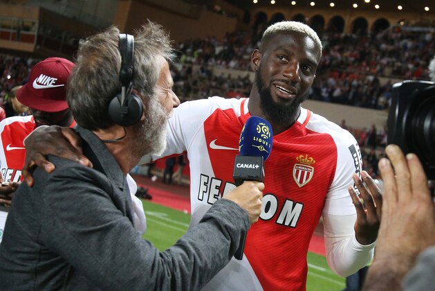 MONACO, MONACO - MAY 17: Tiemoue Bakayoko of Monaco is interviewed by Laurent Paganelli during the French League 1 Championship title celebration following the French Ligue 1 match between AS Monaco and AS Saint-Etienne (ASSE) at Stade Louis II on May 17, 2017 in Monaco, Monaco. (Photo by Jean Catuffe/Getty Images) MONACO, MONACO - MAY 17: Tiemoue Bakayoko of Monaco is interviewed by Laurent Paganelli during the French League 1 Championship title celebration following the French Ligue 1 match between AS Monaco and AS Saint-Etienne (ASSE) at Stade Louis II on May 17, 2017 in Monaco, Monaco. (Photo by Jean Catuffe/Getty Images)