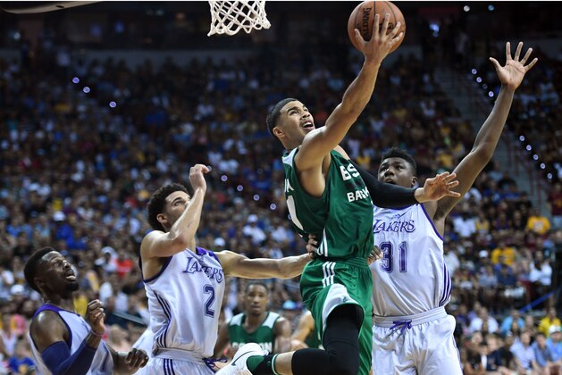 Jul 8, 2017; Las Vegas, NV, USA; Boston Celtics forward Jayson Tatum (11) goes up for a layup against the Los Angeles Lakers during the second half at Thomas & Mack Arena. Mandatory Credit: Joe Camporeale-USA TODAY Sports