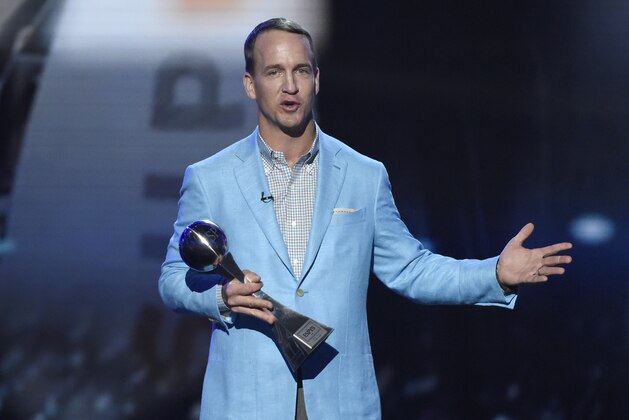 FILE - In this July 13, 2016, file photo, former NFL football player Peyton Manning accepts the icon award at the ESPY Awards at the Microsoft Theater in Los Angeles. Peyton Manning will take the stage to host the ESPY Awards. The retired two-time Super Bowl champion quarterback will preside over the July 12 show honoring the past year's best athletes and sports moments. (Photo by Chris Pizzello/Invision/AP, File) FILE - In this July 13, 2016, file photo, former NFL football player Peyton Manning accepts the icon award at the ESPY Awards at the Microsoft Theater in Los Angeles. Peyton Manning will take the stage to host the ESPY Awards. The retired two-time Super Bowl champion quarterback will preside over the July 12 show honoring the past year's best athletes and sports moments. (Photo by Chris Pizzello/Invision/AP, File)