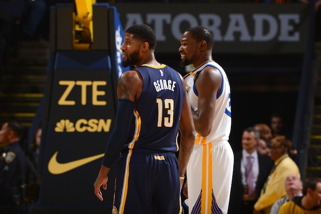 OAKLAND, CA - DECEMBER 5:  Paul George #13 of the Indiana Pacers and Kevin Durant #35 of the Golden State Warriors during the game on December 5, 2016 at ORACLE Arena in Oakland, California. NOTE TO USER: User expressly acknowledges and agrees that, by downloading and or using this photograph, user is consenting to the terms and conditions of Getty Images License Agreement. Mandatory Copyright Notice: Copyright 2016 NBAE (Photo by Noah Graham/NBAE via Getty Images)