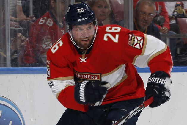 Florida Panthers left wing Thomas Vanek (26) chases a loose puck during the first period of an NHL hockey game against the Buffalo Sabres, Saturday, April 8, 2017, in Sunrise, Fla. The Panthers defeated the Sabres 3-0. (AP Photo/Joel Auerbach)