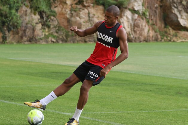 Monaco's French forward Kylian Mbappe Lottin plays with the ball during a training session in La Turbie near Monaco,  on July 10, 2017.  / AFP PHOTO / VALERY HACHE        (Photo credit should read VALERY HACHE/AFP/Getty Images)