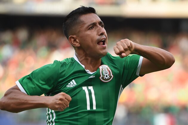 Mexico's Elias Hernandez (11) celebrates his goal against El Salvador in Group C play in the 2017 CONCACAF Gold Cup, July 9, 2017 at Qualcomm Stadium in San Diego, California. / AFP PHOTO / Robyn Beck        (Photo credit should read ROBYN BECK/AFP/Getty Images)