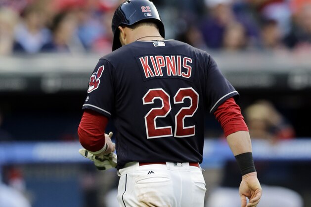 Cleveland Indians' Jason Kipnis walks back to the dugout after grounding out to Detroit Tigers starting pitcher Justin Verlander in the third inning of a baseball game, Saturday, July 8, 2017, in Cleveland. (AP Photo/Tony Dejak)