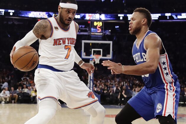 New York Knicks' Carmelo Anthony (7) is defended by Philadelphia 76ers' Justin Anderson (23) during the second half of an NBA basketball game, Wednesday, April 12, 2017, in New York. The Knicks won 114-113. (AP Photo/Frank Franklin II)