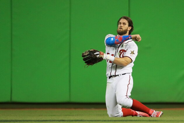 MIAMI, FL - JULY 11:  Bryce Harper #34 of the Washington Nationals and the National League reacts after catching a ball hit by Salvador Perez #13 of the Kansas City Royals and the American League for an out to end the second inning during the 88th MLB All-Star Game at Marlins Park on July 11, 2017 in Miami, Florida.  (Photo by Mike Ehrmann/Getty Images)