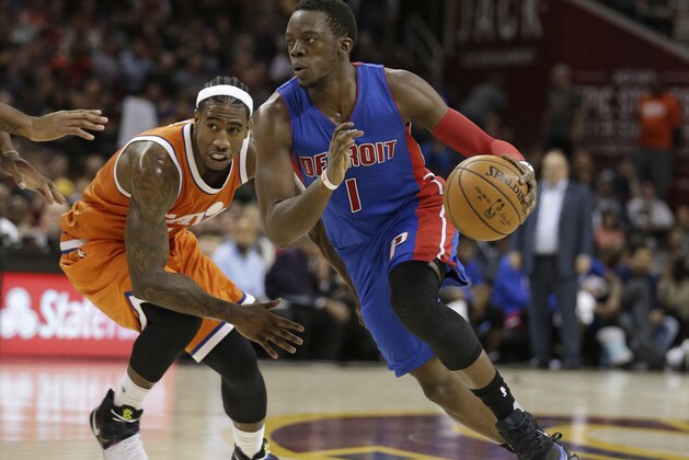 Detroit Pistons' Reggie Jackson (1), from Italy, drives past Cleveland Cavaliers' Iman Shumpert (4) in the second half of an NBA basketball game, Tuesday, March 14, 2017, in Cleveland. The Cavaliers won 128-96. (AP Photo/Tony Dejak)