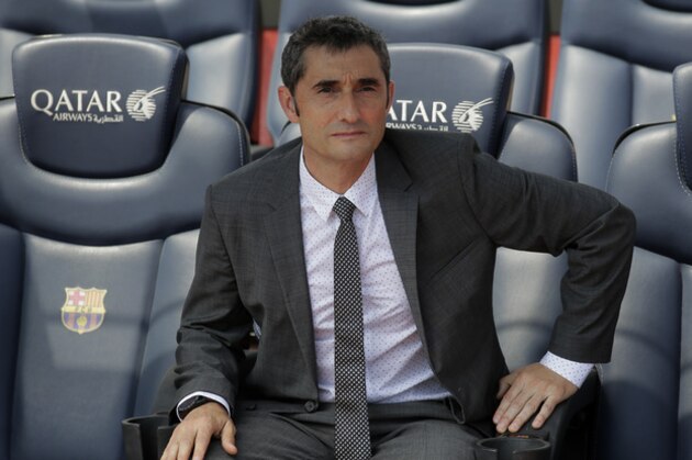 FC Barcelona's new signing coach Ernesto Valverde poses to the media during his official presentation at the Camp Nou stadium in Barcelona, Spain, Thursday, June 1, 2017. Former player Valverde was hired as the new coach, the club confirmed on Monday. (AP Photo/Manu Fernandez)