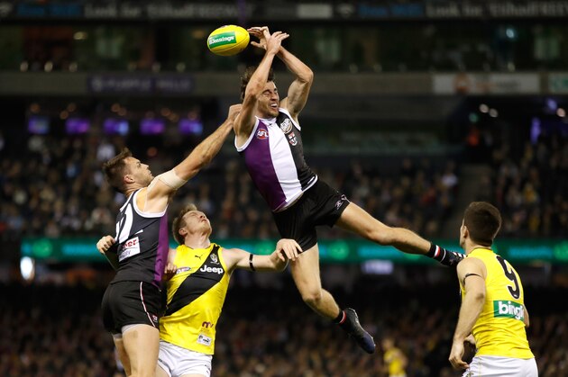 MELBOURNE, AUSTRALIA - JULY 08: (L-R) Nathan Brown of the Saints, Jack Riewoldt of the Tigers, Daniel McKenzie of the Saints and Trent Cotchin of the Tigers compete for the ball during the 2017 AFL round 16 match between the St Kilda Saints and the Richmond Tigers at Etihad Stadium on July 08, 2017 in Melbourne, Australia. (Photo by Michael Willson/AFL Media/Getty Images)