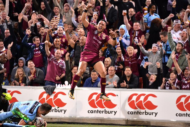 BRISBANE, AUSTRALIA - JULY 12:  Valentine Holmes of the Maroons celebrates scoring a try during game three of the State Of Origin series between the Queensland Maroons and the New South Wales Blues at Suncorp Stadium on July 12, 2017 in Brisbane, Australia.  (Photo by Bradley Kanaris/Getty Images)