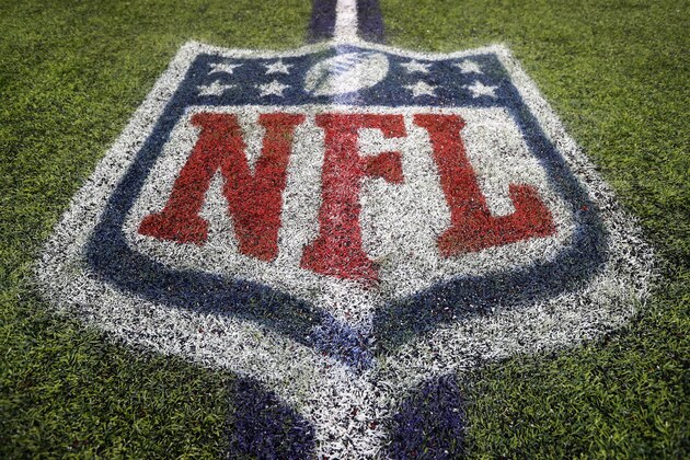 The NFL logo is seen on the field after an NFL football game between the Indianapolis Colts and the Minnesota Vikings, Sunday, Dec. 18, 2016, in Minneapolis. (AP Photo/Charlie Neibergall)