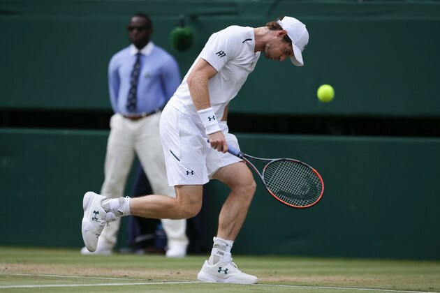 Britain's Andy Murray misses a return against US player Sam Querrey during their men's singles quarter-final match on the ninth day of the 2017 Wimbledon Championships at The All England Lawn Tennis Club in Wimbledon, southwest London, on July 12, 2017. / AFP PHOTO / Daniel LEAL-OLIVAS / RESTRICTED TO EDITORIAL USE (Photo credit should read DANIEL LEAL-OLIVAS/AFP/Getty Images) Britain's Andy Murray misses a return against US player Sam Querrey during their men's singles quarter-final match on the ninth day of the 2017 Wimbledon Championships at The All England Lawn Tennis Club in Wimbledon, southwest London, on July 12, 2017. / AFP PHOTO / Daniel LEAL-OLIVAS / RESTRICTED TO EDITORIAL USE (Photo credit should read DANIEL LEAL-OLIVAS/AFP/Getty Images)